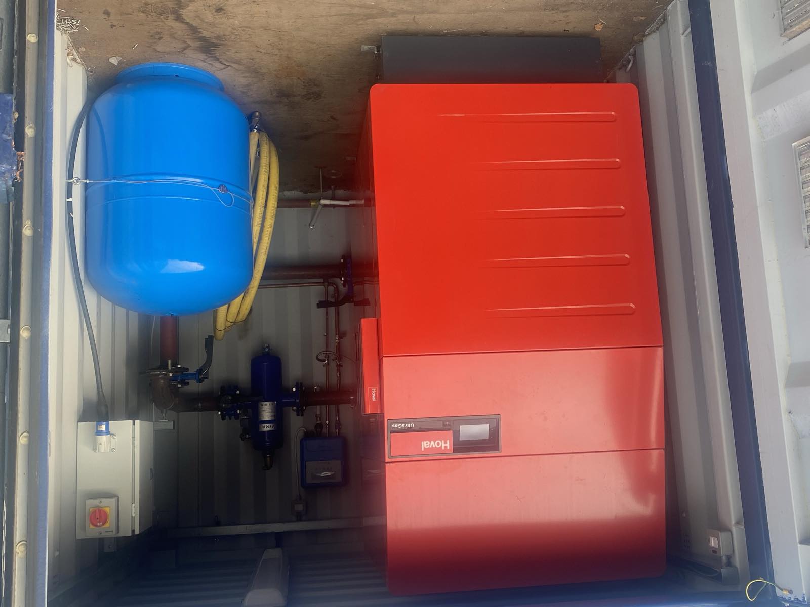 A 250kW gas condensing boiler inside its lockable container